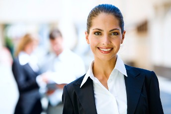 Professional Woman Standing and Smiling